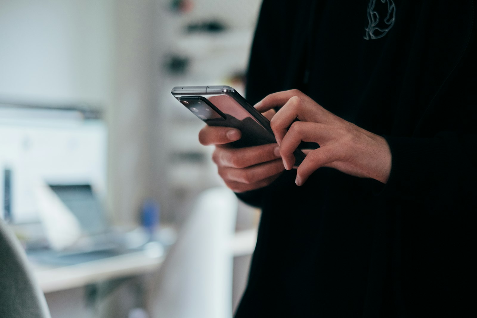 Person holding black android smartphone — photo by Jonas Leupe on Unsplash