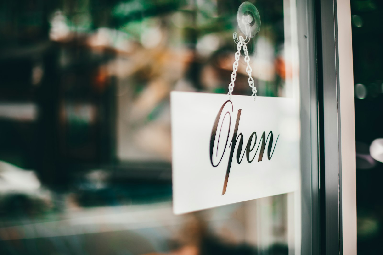 A close up of a sign on a window — photo by Anima Visual on Unsplash