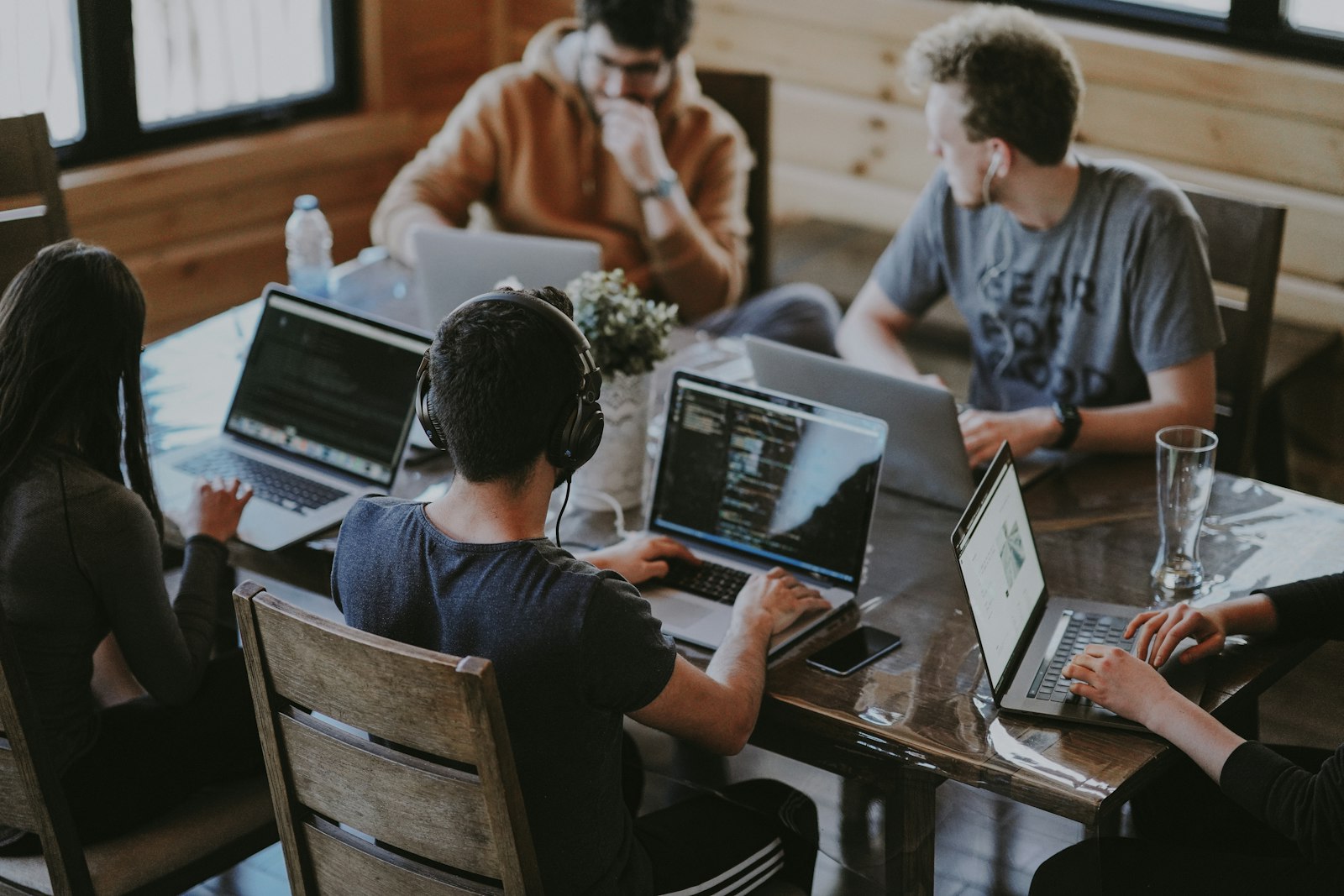 Group of people using laptop computer — photo by Annie Spratt on Unsplash